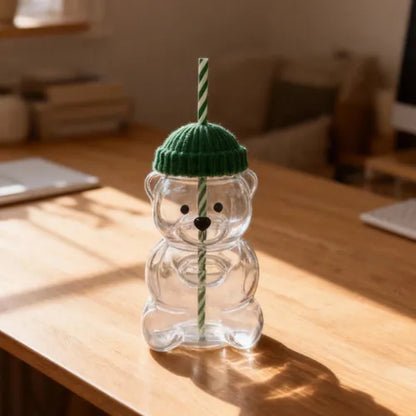 The bear-shaped glass comes with a coaster/sleeve.